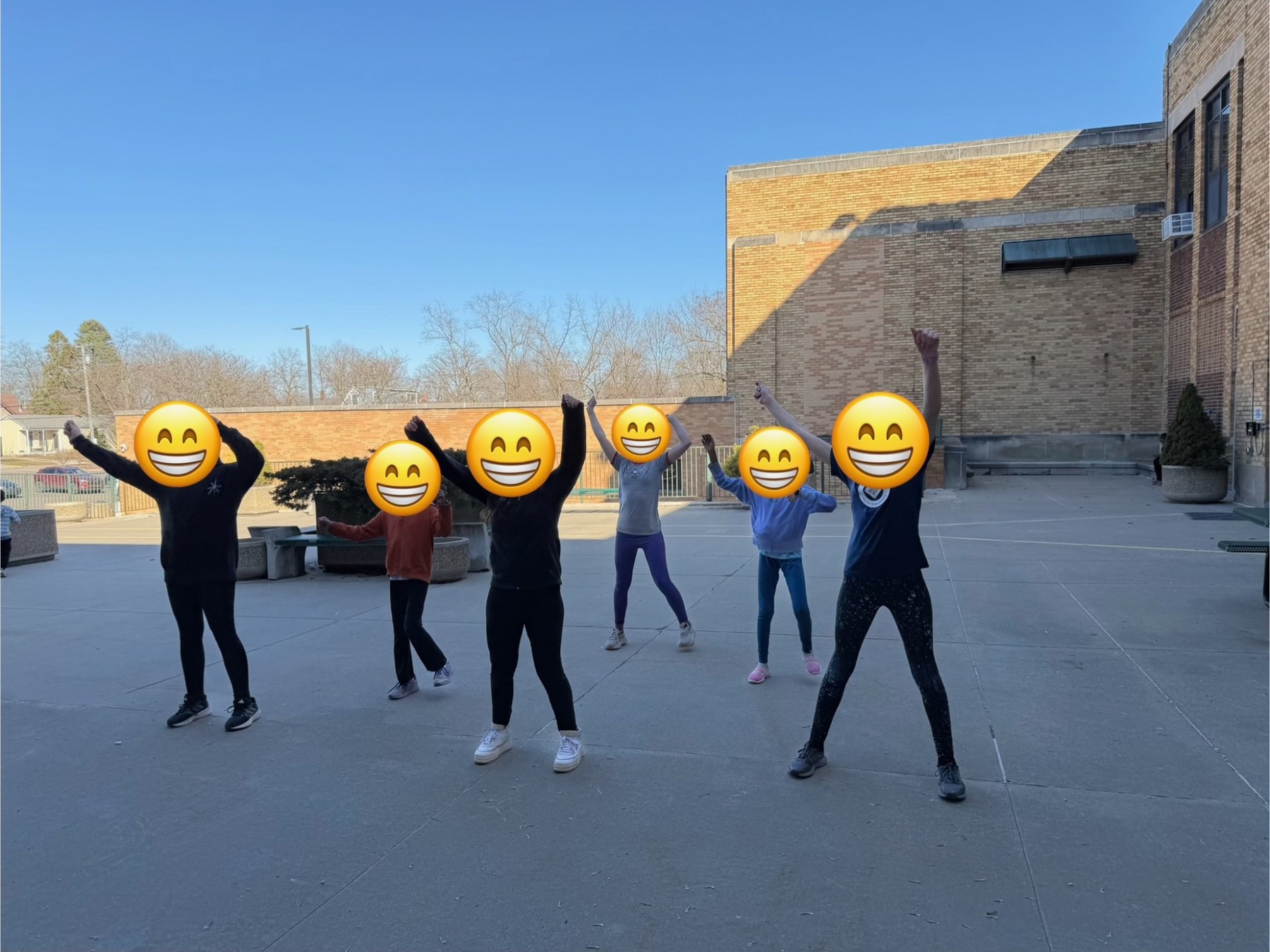 Theater club students doing an outdoor movement exercise